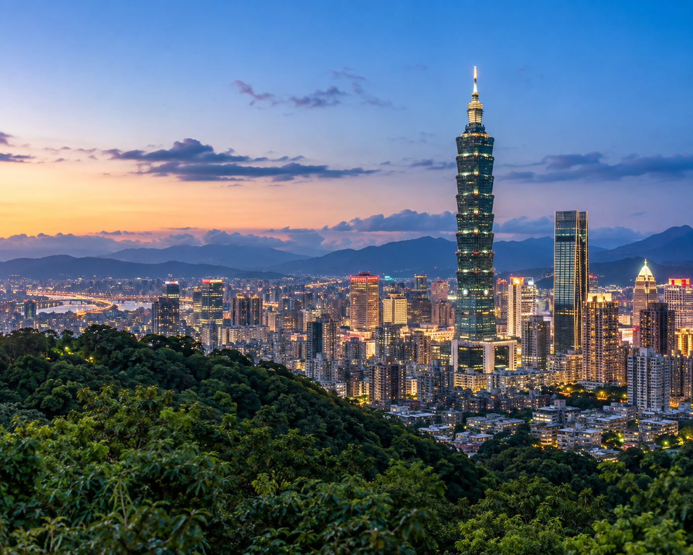 Colorful fireworks illuminate the night sky over a bustling Taiwan city, creating a festive and lively atmosphere.