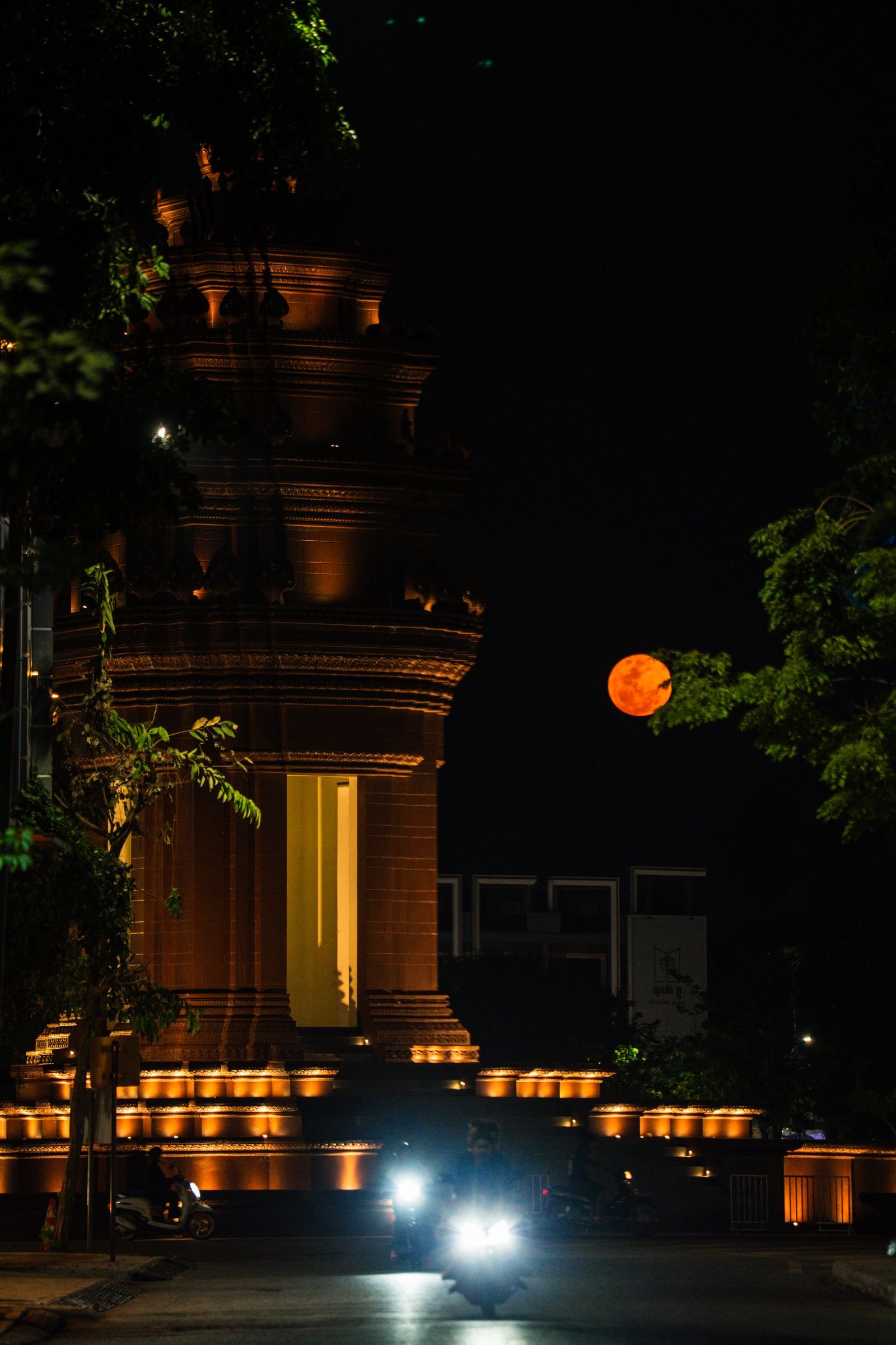 Illuminated temple at night in Battambang, Cambodia