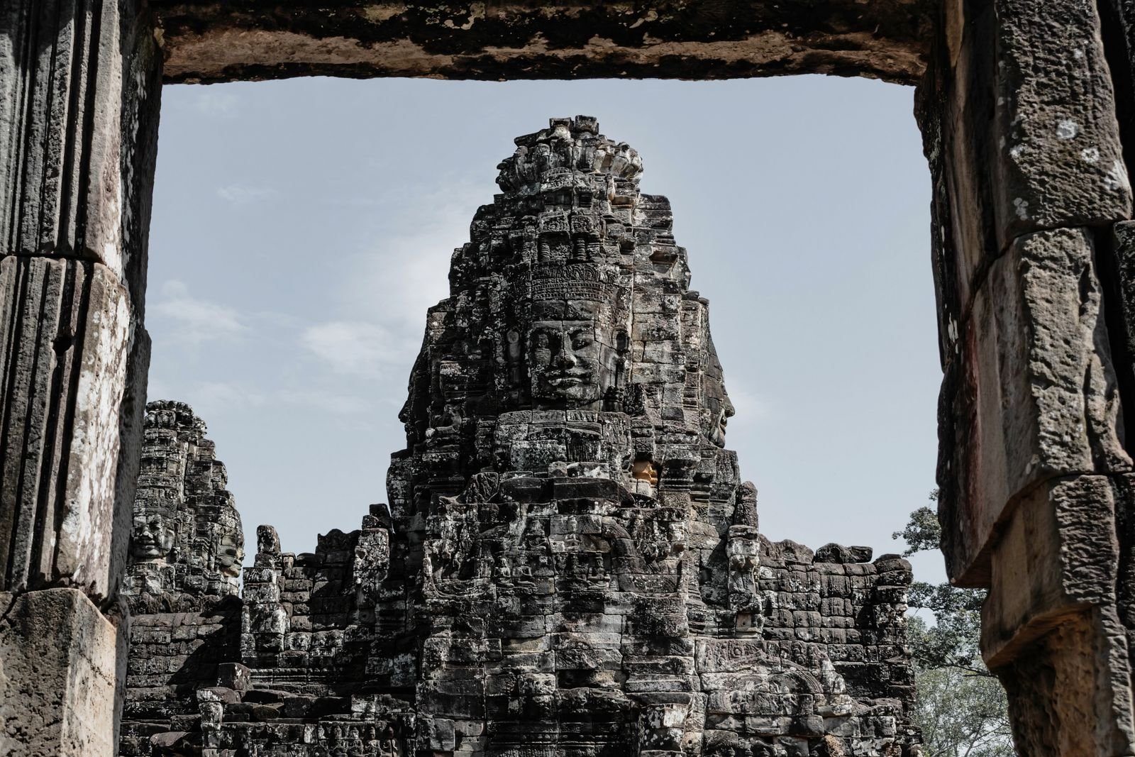 Carved stone face tower at Bayon Temple, Siem Reap, Cambodia