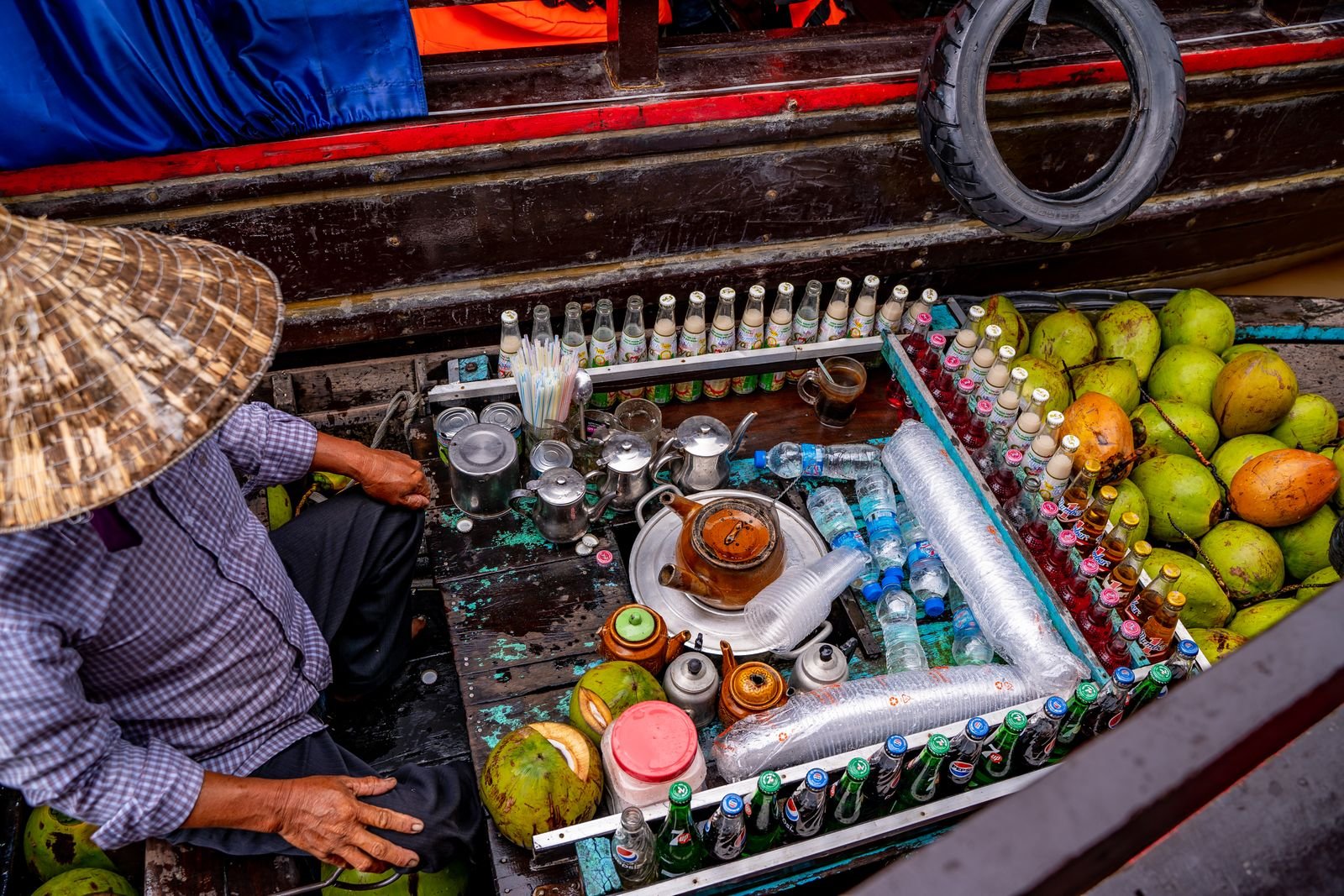 Beverages and coconuts at Can Tho floating market
