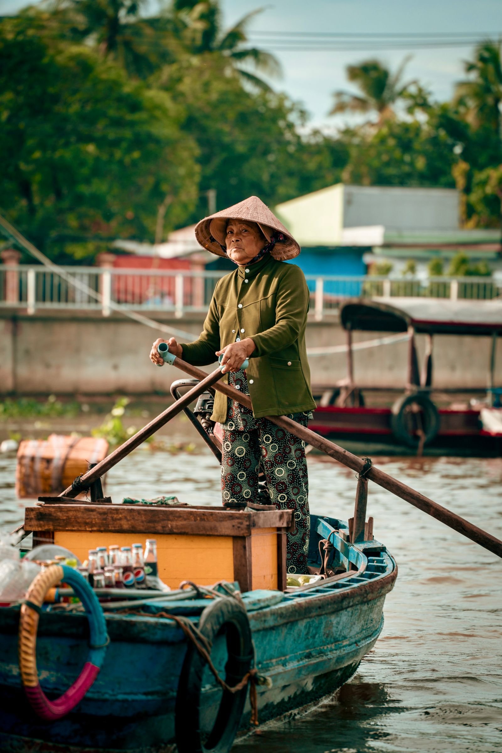Woman on a boat in the Mekong Delta at Can Tho
