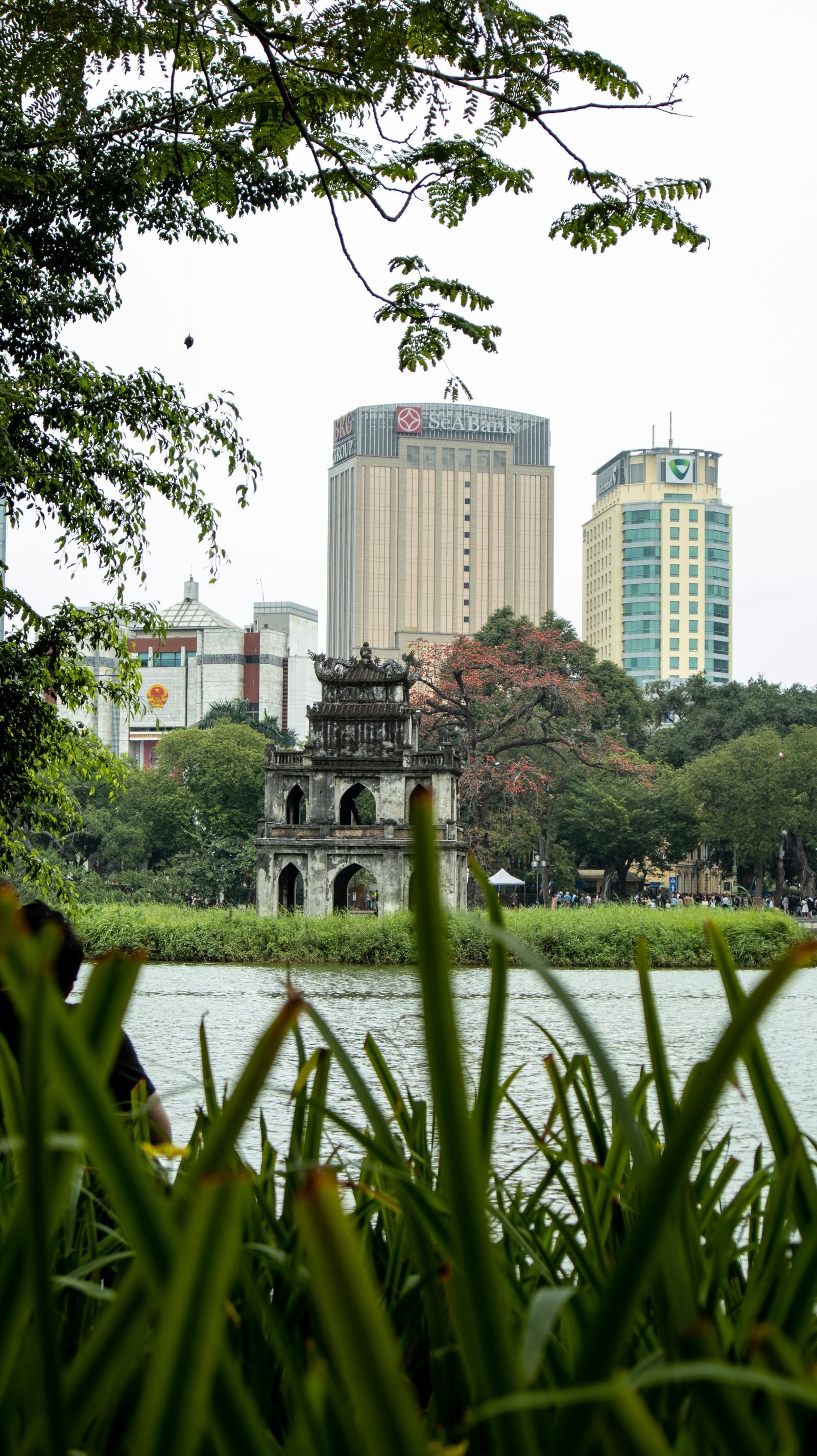 Turtle Tower and Hanoi skyline at Hoan Kiem Lake